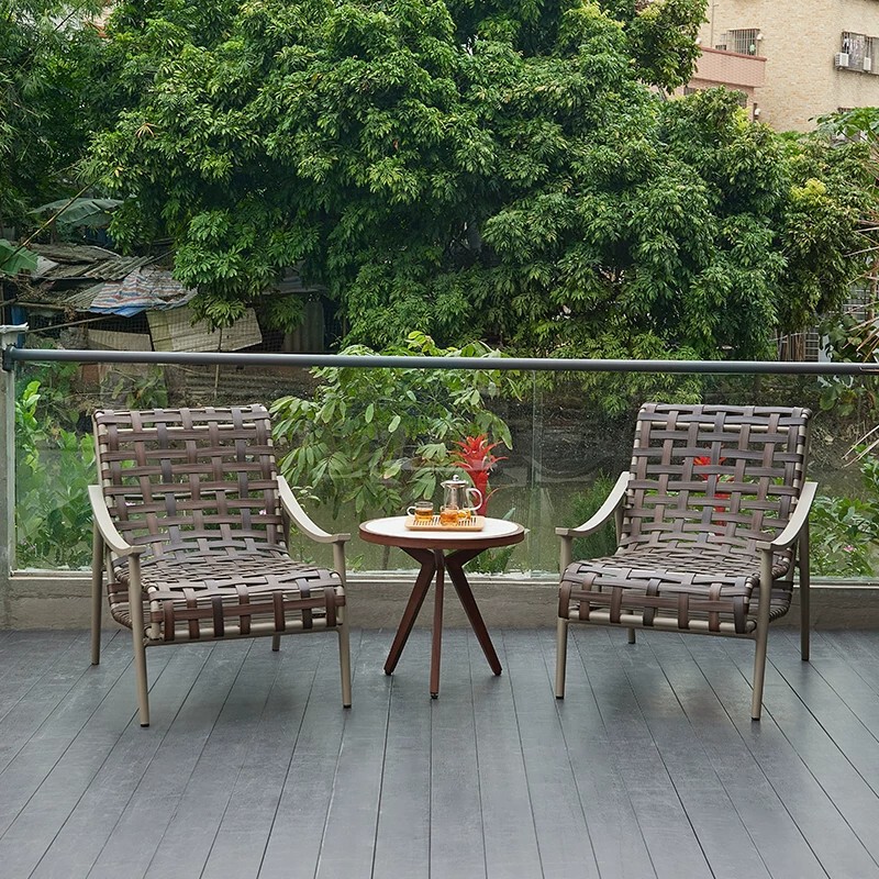 Outdoor table and chair set, including a leisure tea table, single rattan chair, patio or balcony backrest lounge chair, and a coffee table – a three-piece set Outdoor table and chair set, including a leisure tea table, single rattan chair, patio or balcony backrest lounge chair, and a coffee table – a three-piece set