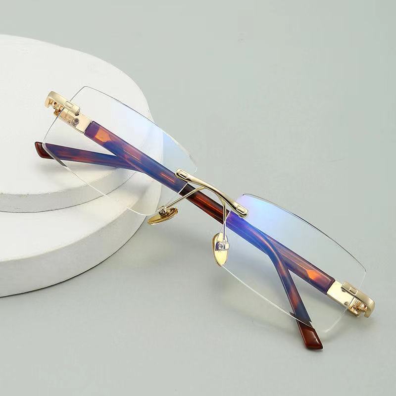 Nuevo Ajuste de moda elegante sin marco gafas de lectura de luz anti-azul para los ancianos gafas de lectura de metal para los ancianos