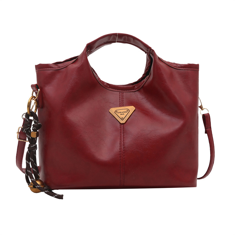 Bolso de mano retrógrado nicho mujer 2025 nuevo estilo de piel de cera de aceite para viajar bolso de hombro de gran capacidad relajado mochila