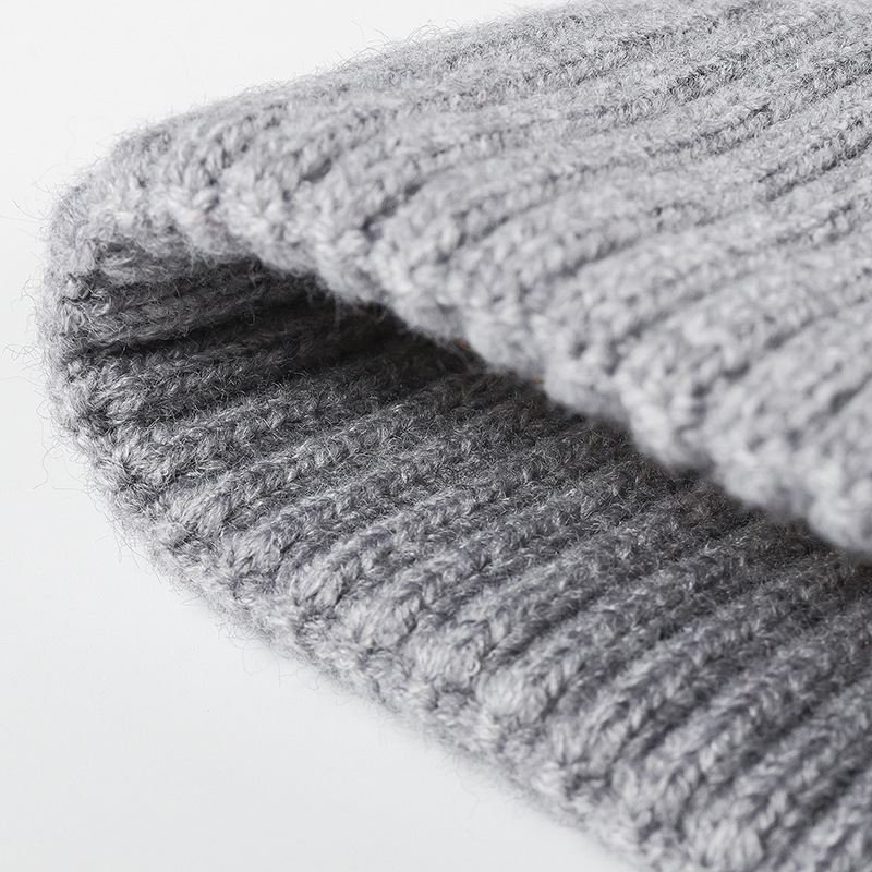 Venta al por mayor de fábrica, cobertura de jacquard de exportación, sombrero de punto con reborde, cálido y grueso, sombrero frío de cachemira de imitación, otoño e invierno, nuevos hombres y mujeres