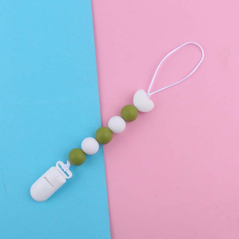 Nuevo bebé suministros de dibujos animados amor silicona DIY creativo macaron color serie mordedura cola molar pezón