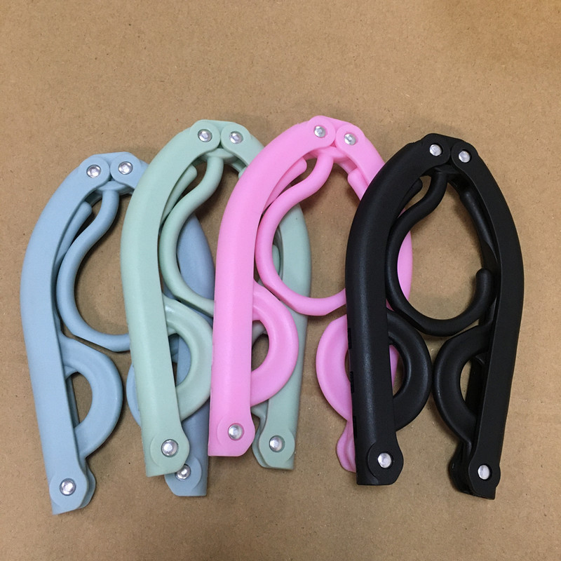 Percha plegable de viaje engrosada para el hogar multifunción de viaje portátil plástico mágico disponible para estudiantes