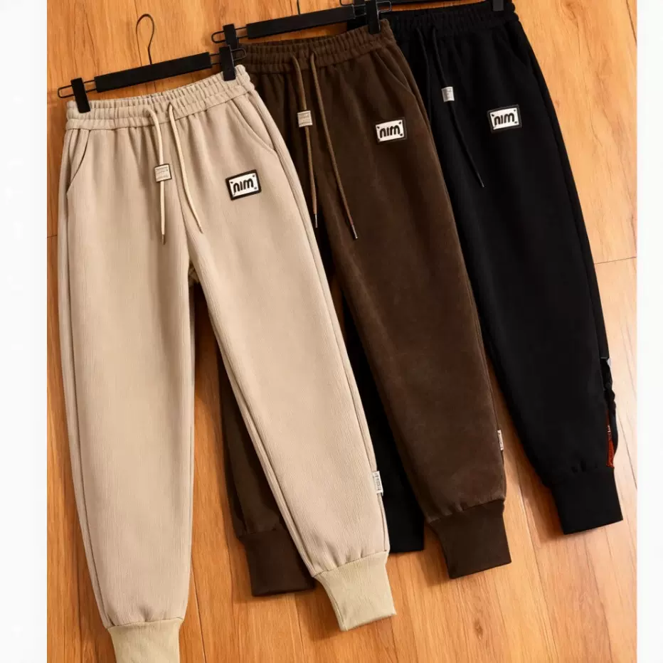 加工定制秋冬加绒卫裤 来样/贴牌定做 宽松束脚休闲裤批量生产