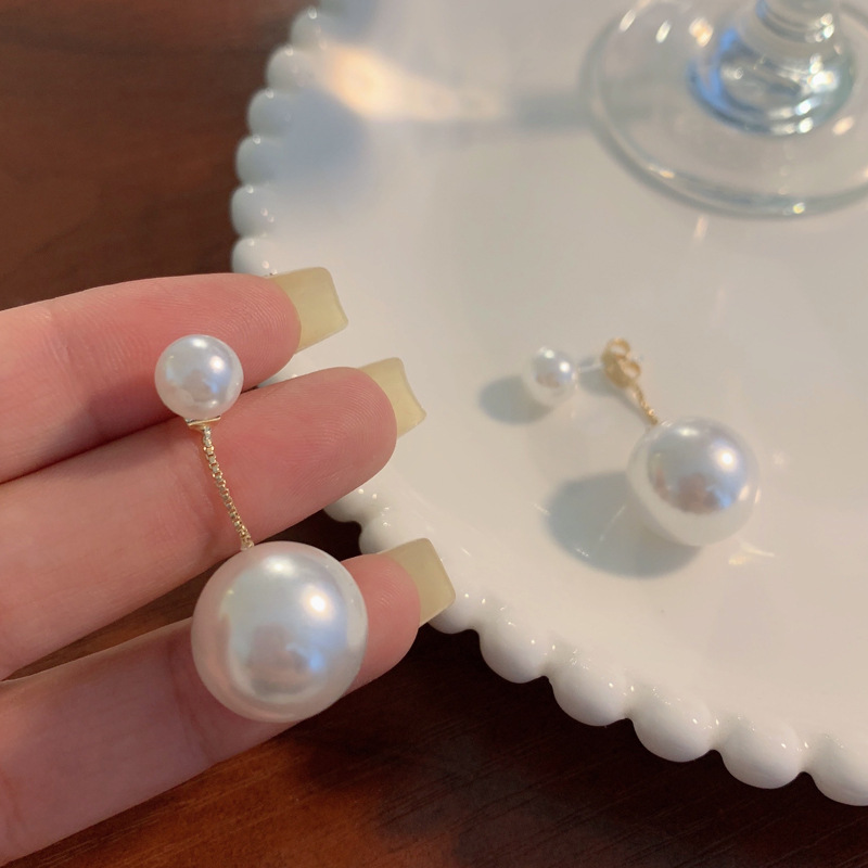 Elegant Geometric Imitation Pearl Alloy Earrings display picture 1