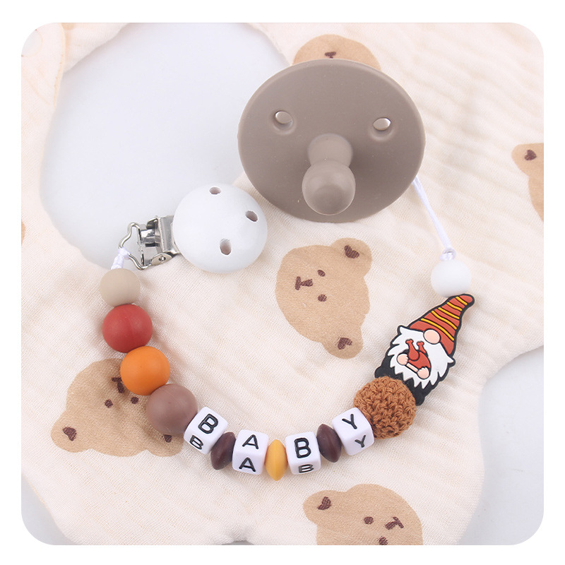 Nuevo BABY letras plásticas de madera chupeta clips Santa Claus silicona bebé pacificador chupeta cadena anti-caída cadena