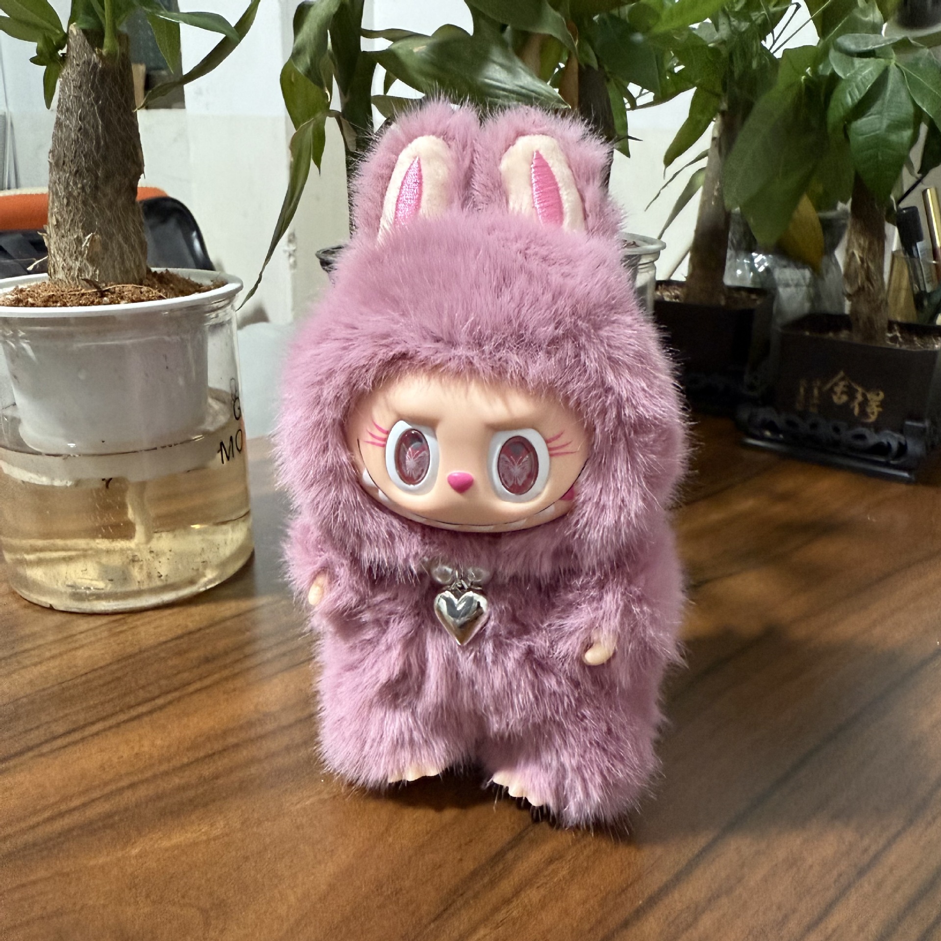 Quality fuchsia plush toy with butterfly