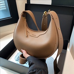国境を越えた小衆ギョーザのバッグ女性バッグ2025新型レトロファッション通勤シングル肩脇下バッグ女性ショルダーバッグ