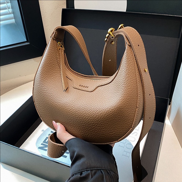 Bolso de bola de masa de nicho transfronterizo bolso de mujer 2025 nuevo bolso de hombro de viajero de moda retro bolso de mensajero de mujer