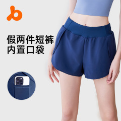 Juyitang フェイクツーピース速乾性スポーツショーツ女性用通気性露出防止サイドポケットランニングフィットネスヨガショーツ