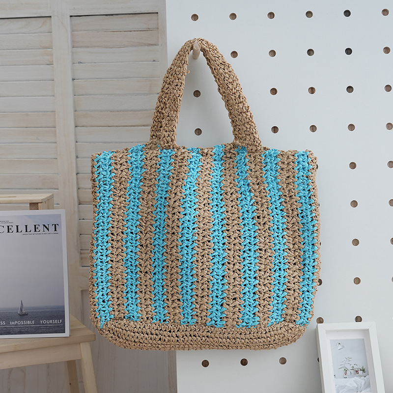 Nueva playa tejida bolsa de viaje de las niñas bolso de mano retro portátil bolsa de paja de gran capacidad bolso de hombro a rayas