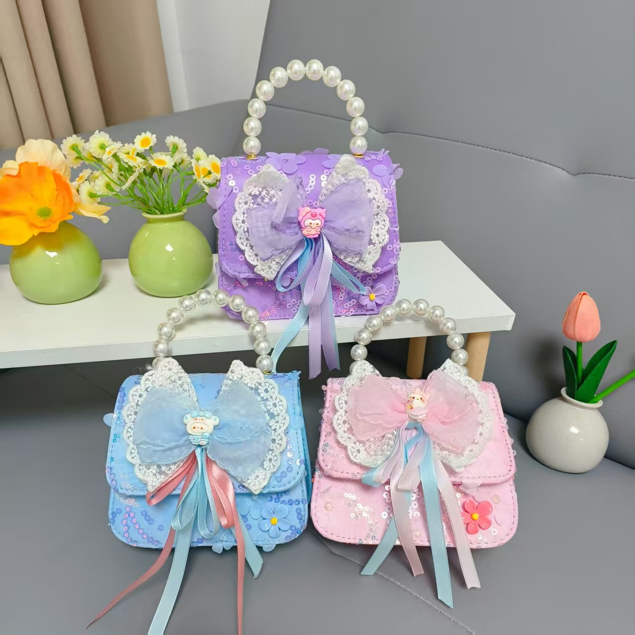 Bow princess pearl bolso Melody KT felino mochila accesorios de chicas pequeñas cadenas de viento fragante bolso para niños