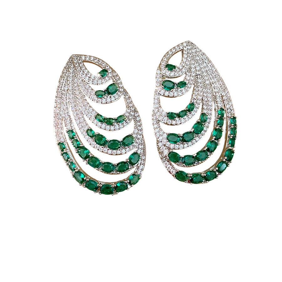 Aguja de plata zircon oval multicapa personalidad temperamento nicho pendientes de moda ligero lujo alta sensación auriculares al por mayor