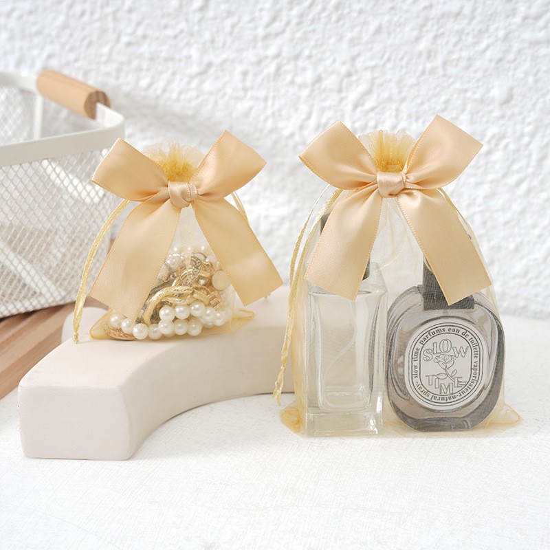 Bolso de gasa con lazo dorado transfronterizo, bolsa de dulces de boda, bolsa de regalo para fiesta, bolsa de embalaje de regalo, bolsillo con cordón