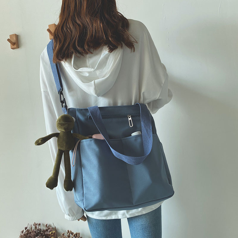 Bolsa de lona impermeable bolsa de hombro de verano para mujer bolsa de gran capacidad para mujer bolsa de mensajero para estudiantes universitarios