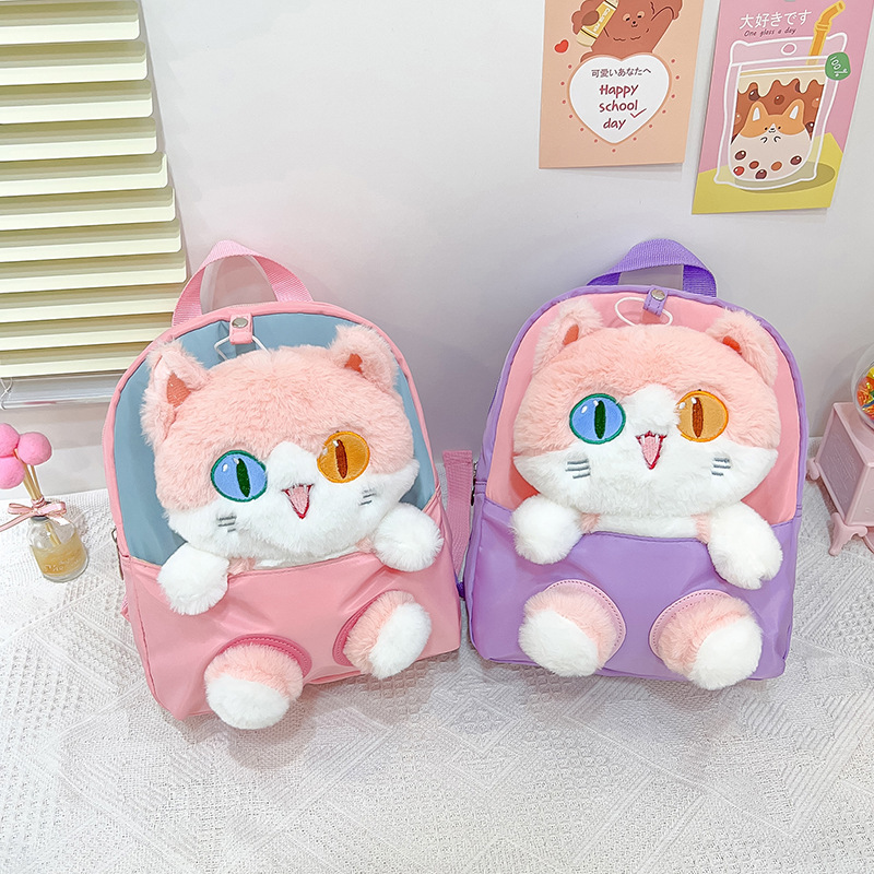 Nueva mochila de dibujos animados para niños tendencia pupila diferente gato muñeca mochila desmontable jardín de infantes en stock