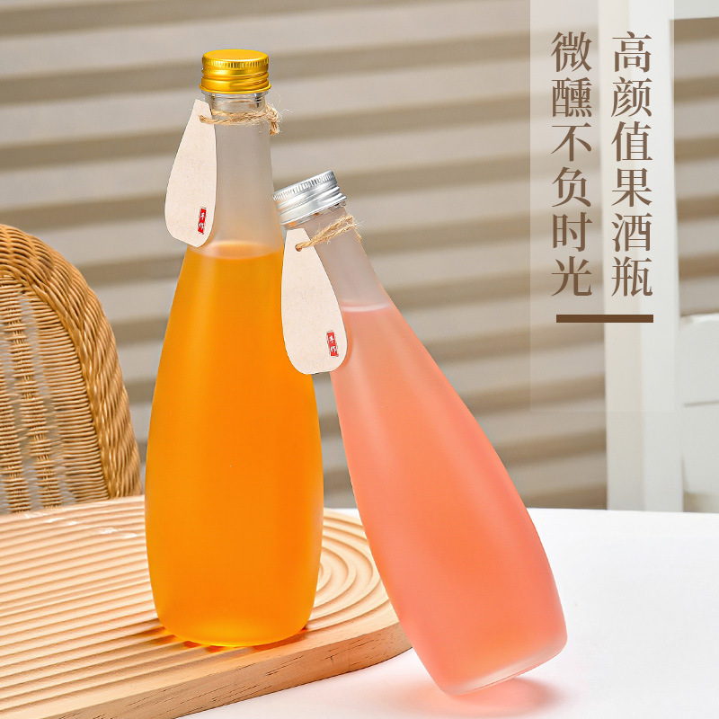 卸売厚みのあるつや消しミネラルウォーターボトル透明ガラスボトル蓋付き密封ジュースソーダ飲料ボトル|undefined