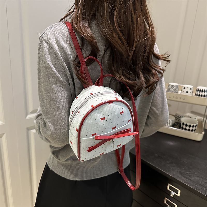 Bolsa de hombro de estilo académico coreano para mujeres 2026 nueva moda de verano mochila de arco pequeña bolsa de compras
