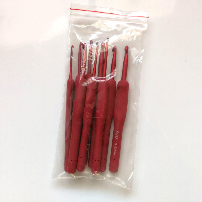 Nuevo juego de herramientas tejidas crochet TPR silicona crochet de aluminio mango rojo pegamento crochet de aluminio juego completo 9 PU
