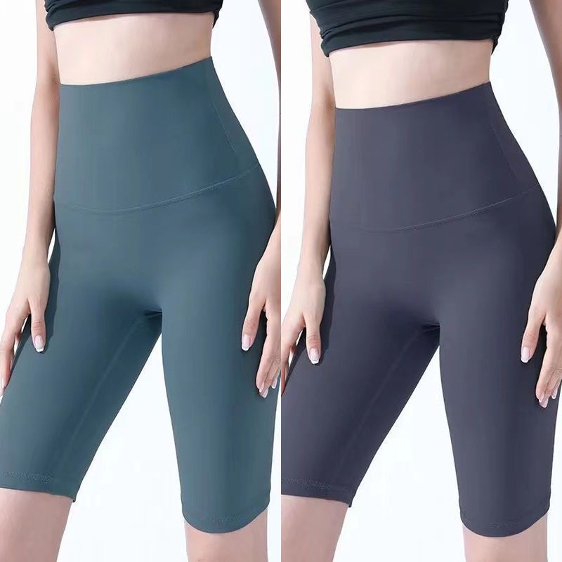 Pantalones cortos desnudos de mujer elásticos apretados para elevar las caderas de cinco puntos pantalones deportivos de secado rápido succión de sudor entrenamiento para correr fábrica de comercio de ping