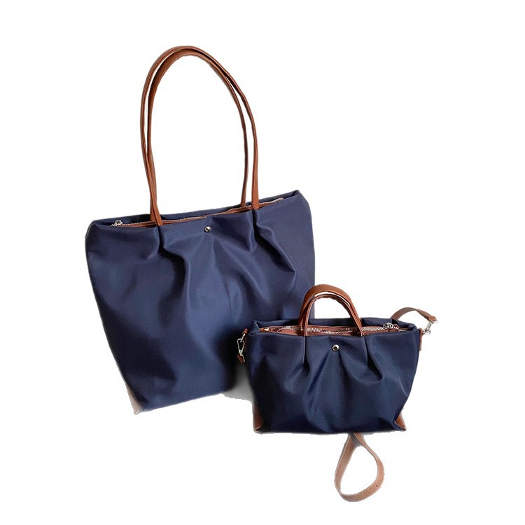 Borsa a tracolla casual da donna in tessuto Oxford, capiente, elegante e versatile, ideale per gli spostamenti quotidiani._voghion.com