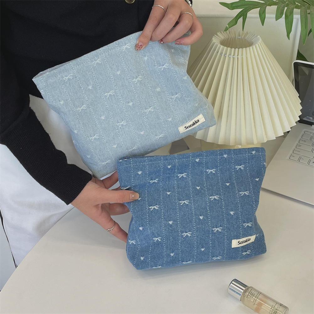 416g Weight Canvas Lining Material Zipper Closure Type / Strap Type Cosmetic Bag Bags Type Holiday, Travel, Daily Occasion Denim Material Bag, Cattle, Knot, Butterfly, Bow Knot Pattern All Seasons Season Women's Gender Cute Style Square Shape Cute Bag Cattle Knot Denim Square Makeup Bags 12