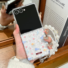 Samsung Galaxy Z Flip6 携帯電話ケースに適した透明な水の波紋の小さな花柄折りたたみスクリーンブレスレット保護カバー