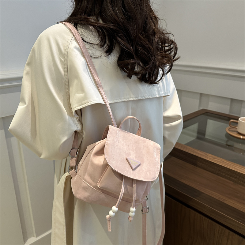 Mochila para niñas 2024 nuevo estilo de diseño de moda nicho mini pequeño blanco ligero lindo mochila de compras