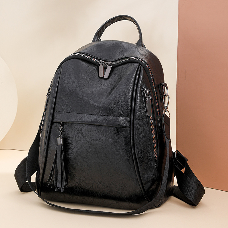 Mochila de mujer al por mayor Mochila de viaje de ocio retro simple transfronteriza multifuncional de gran capacidad bandolera