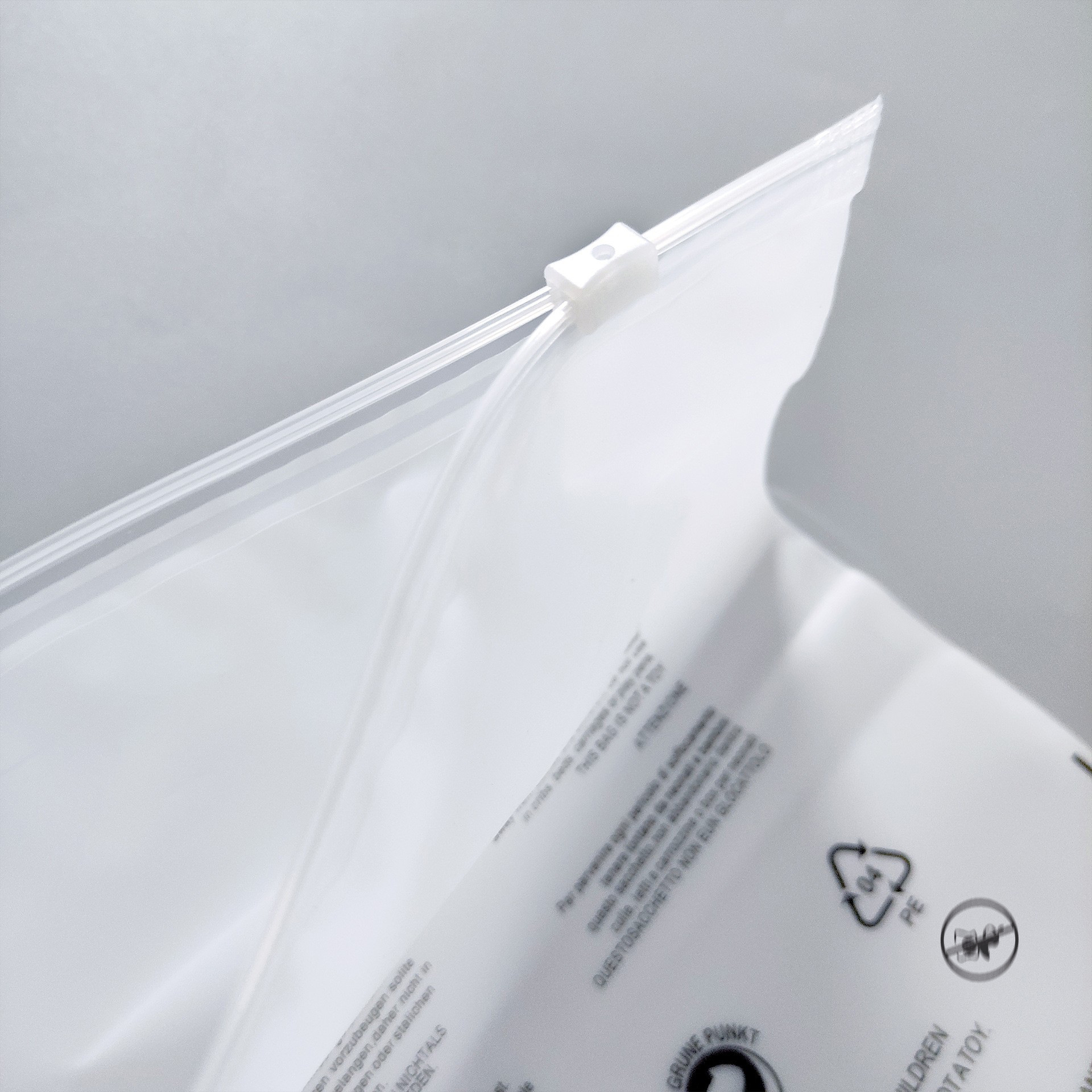 Palabras de advertencia en stock CPE bolsa de cremallera esmerilada bolsa de embalaje de ropa de comercio electrónico transfronterizo bolsa de plástico transparente bolsa ziplock sellada