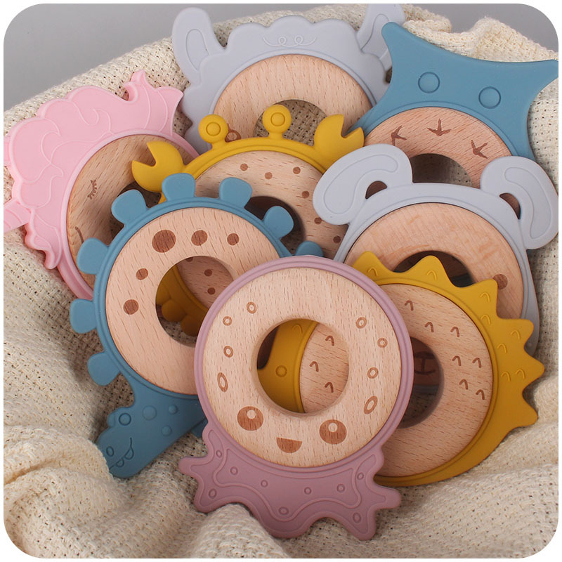Nuevo bebé suministros de dibujos animados serie Animal anillo de madera mordedor bebé creativo mordedura de goma molar juguete de haya