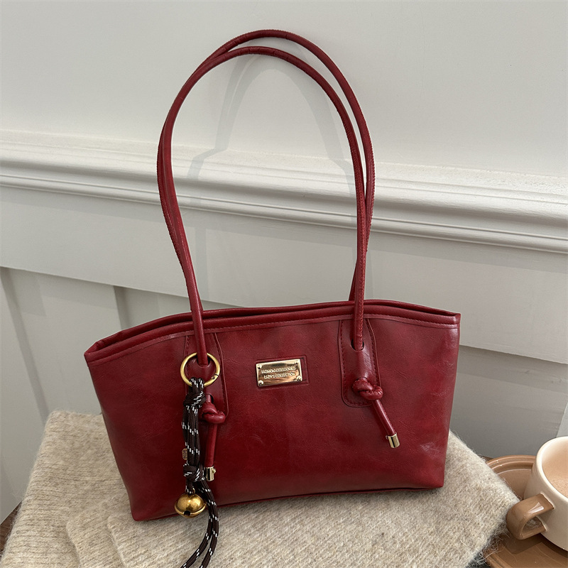 Bagos retro extranjeros para mujeres 2024 nueva moda cera petot bolso de otoño y invierno popular bolsa de hombro de viaje