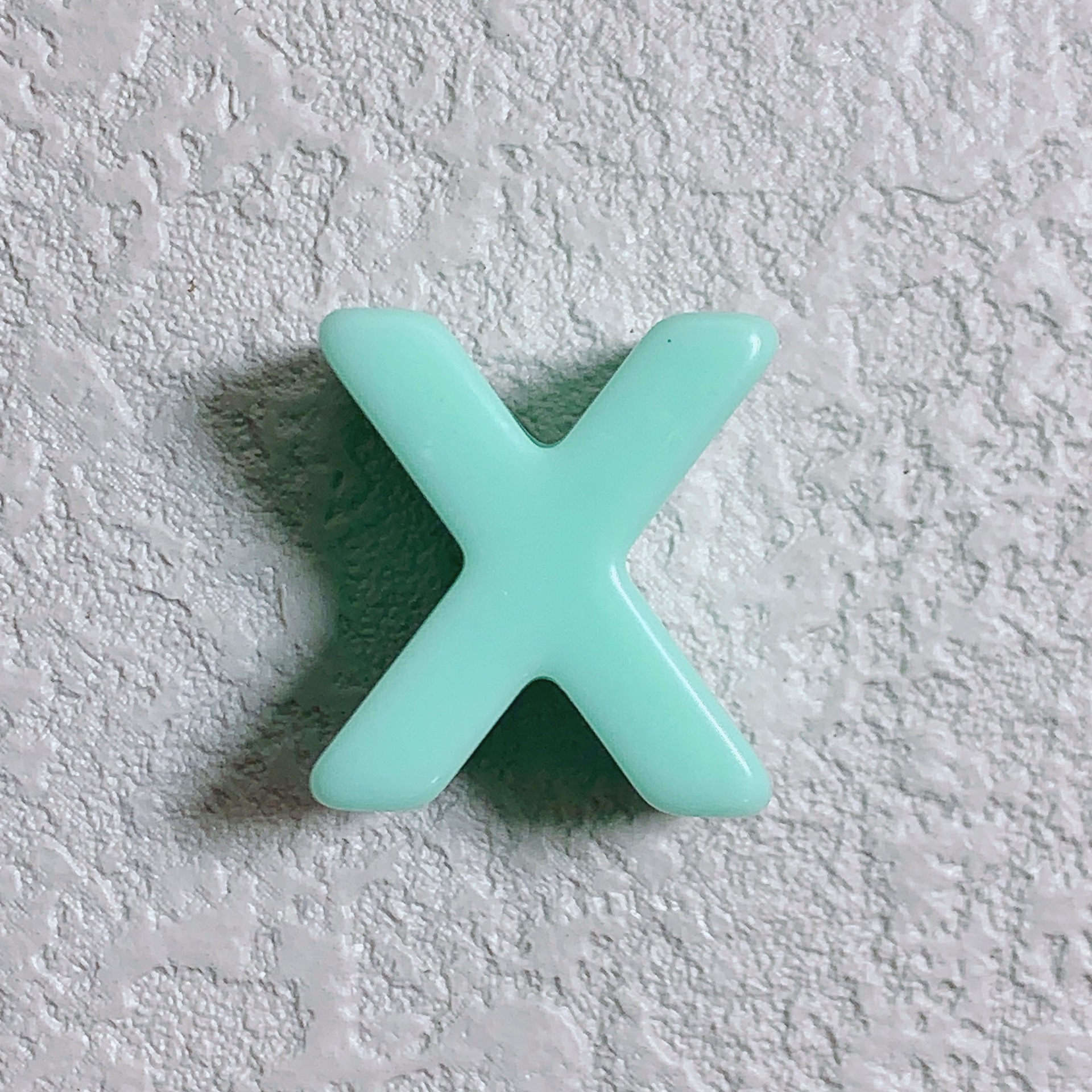 New style: X (turquoise)