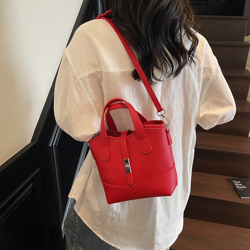 Bolso de textura transfronteriza 2025 verano nuevo bolso femenino moda patrón de lichi bolso bandolera de todo fósforo de color en contraste