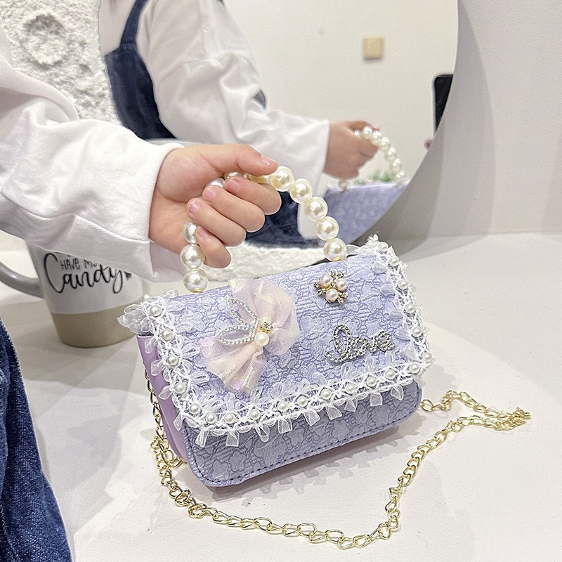 Nuevo tipo de bolso para niños, moda perla portátil, bolso de hombro de la princesa Aisha, estilo extranjero, bolso de hombro para niñas lindas