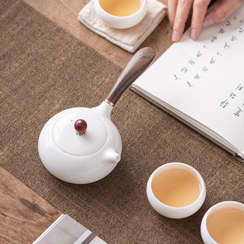 High-end mutton fat jade porcelain side handle teapot single pot Xishi pot household Kung Fu tea set filter teapot simple wholesale