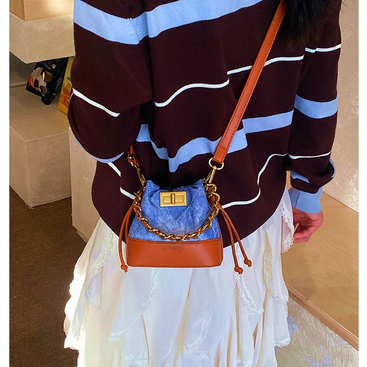 Bolsa de mano de cadena coreana para chicas pequeñas bolsas de cubo mini compactas nuevas bolsas de comercio exterior transfronterizas para niños