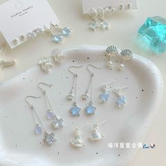 夏の超仙海洋クラゲジルコンイヤリング女性銀針気質甘美で洗練された五角星流蘇貝殻ピアス