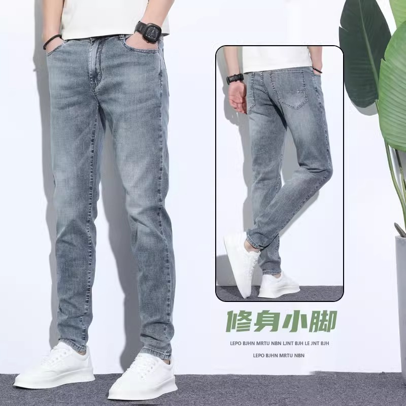 Jeans de primavera para hombres 2025 marca de moda coreana recta delgada pantalones de pie pequeño de verano claro pantalones elásticos para hombres