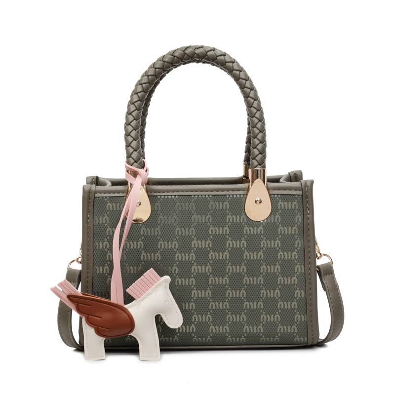 Estilo explosivo transfronterizo con un pequeño bolso cuadrado para mujer 2025 nuevo bolso de hombro tejido de todo fósforo de moda bolso de mensajero de moda