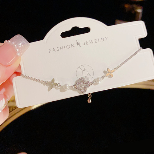 Internet celebrity style, fashionable and elegant, delicate micro-inlaid hollowed-out four-leaf clover bracelet for women, sweet and luxurious all-match bracelet