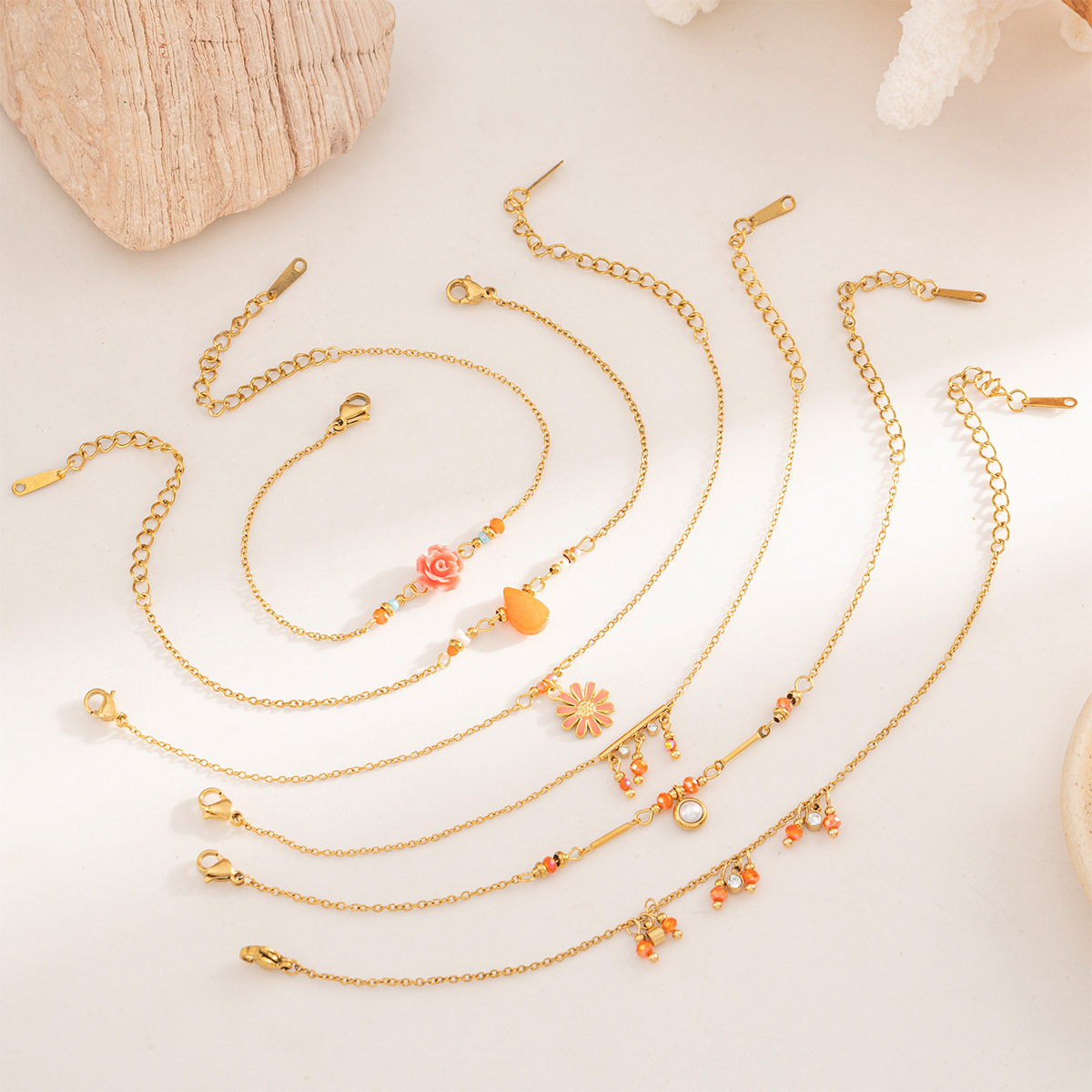 Tena Europa y América naranja con cuentas pulsera de cadena de acero inoxidable apilada y chapada en oro de 18 quilates simple joyería de mano ins para mujer