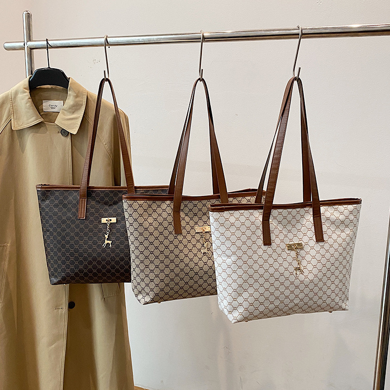 Bolsa de hombro de viaje retro de gran capacidad bolsa de mujer primavera 2025 moda color contrastante empalme brazaleta