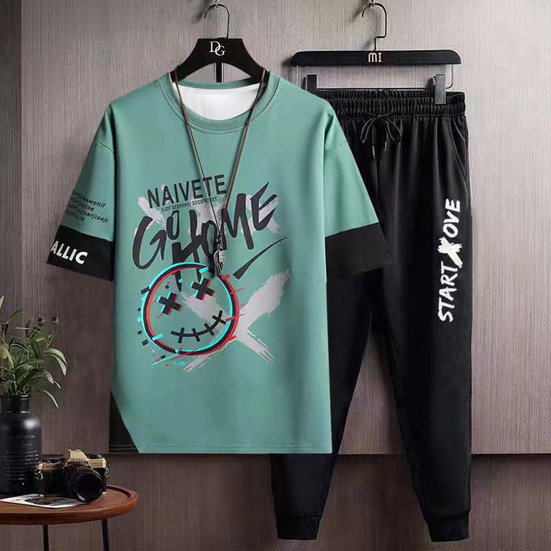 Hip hop Camiseta de manga corta de los hombres de verano de Hong Kong estilo media manga INS de moda todo fósforo camiseta casual pantalones cortos deportivos traje de dos piezas