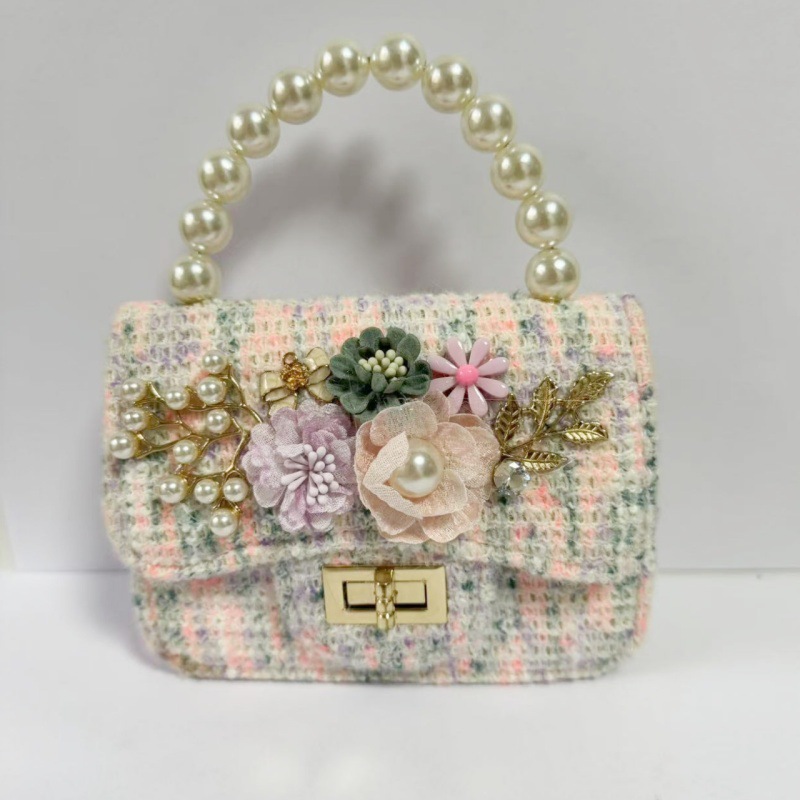 2025 primavera y verano estilo caliente moda casual niños dulces bolsa de gelatina mini bolso de mensajero de un solo hombro variedad al por mayor