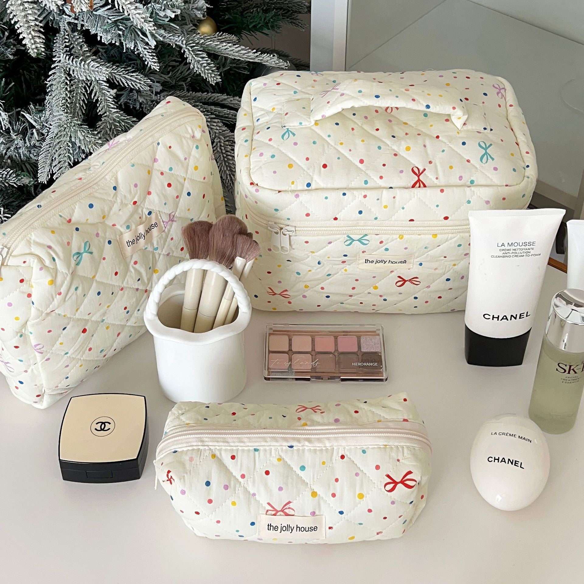 Versión coreana de la bolsa de cosméticos con lazo simple, bolsa de lavado de viaje portátil de gran capacidad, bolsa de almacenamiento de cosméticos para niñas