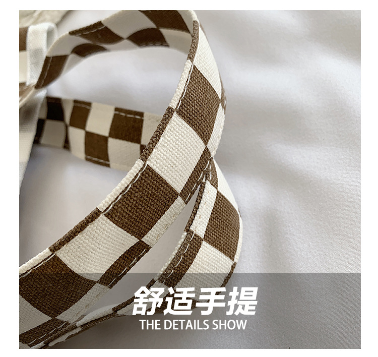 A fashionable new Japanese and Korean chic black and white checkered canvas bag, a large-capacity single-shoulder bag for women, and a simple student handbag undefined