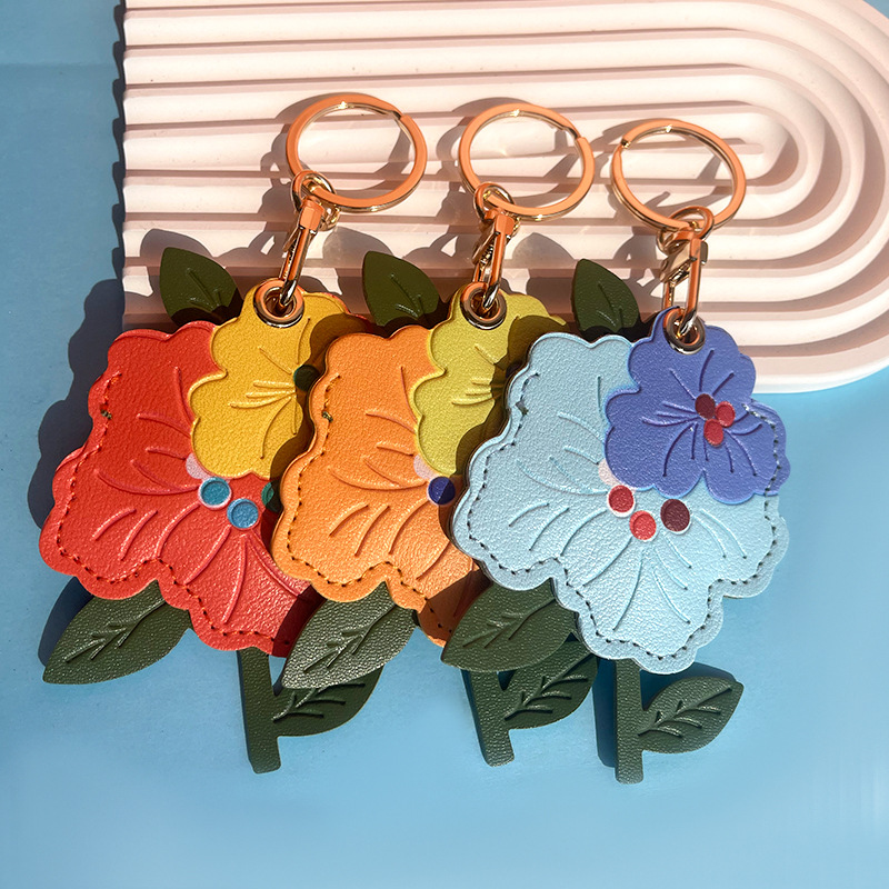 Venta caliente transfronteriza flor de durazno cuero control de acceso funda de tarjeta localizador funda protectora llavero colgante de regalo llavero