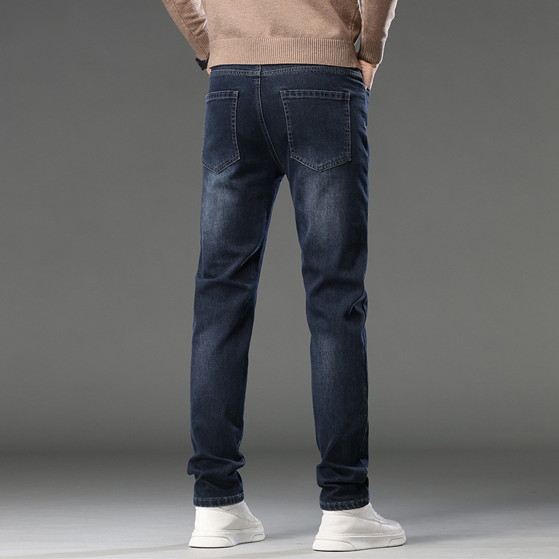 Guangzhou Xintang Pantalones vaqueros de los hombres de otoño e invierno nuevos Pantalones rectos regulares de los hombres jóvenes simples pantalones a juego