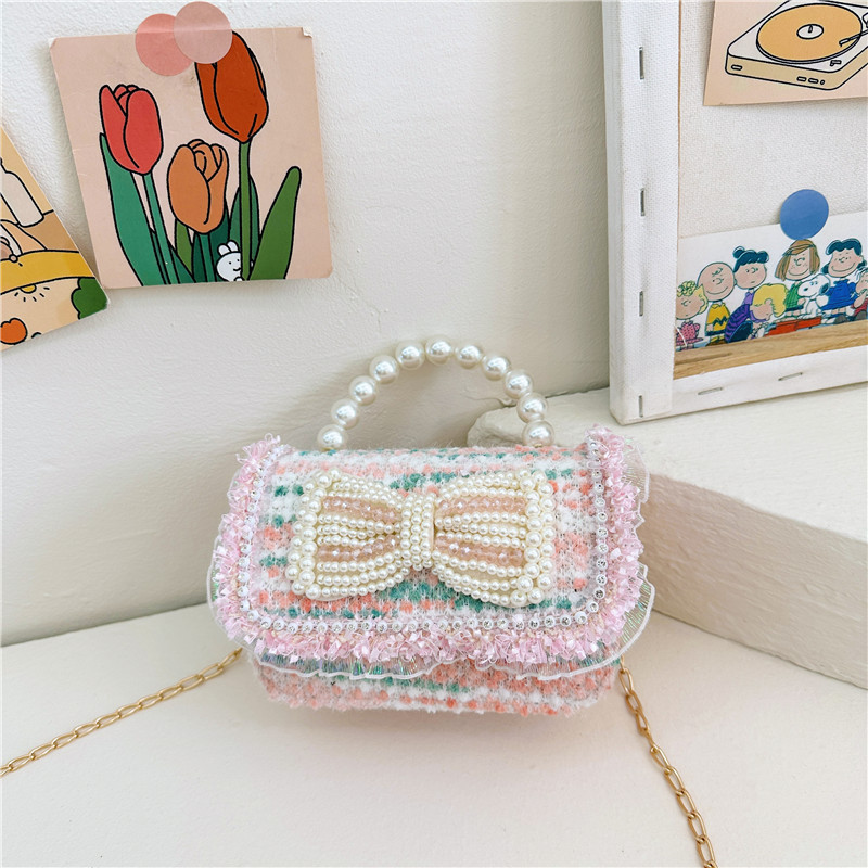 Colorido lentejuelas de los niños bolsa arco accesorios princesa estilo occidental perla bolso coreano mini cadena mensajero bolsa