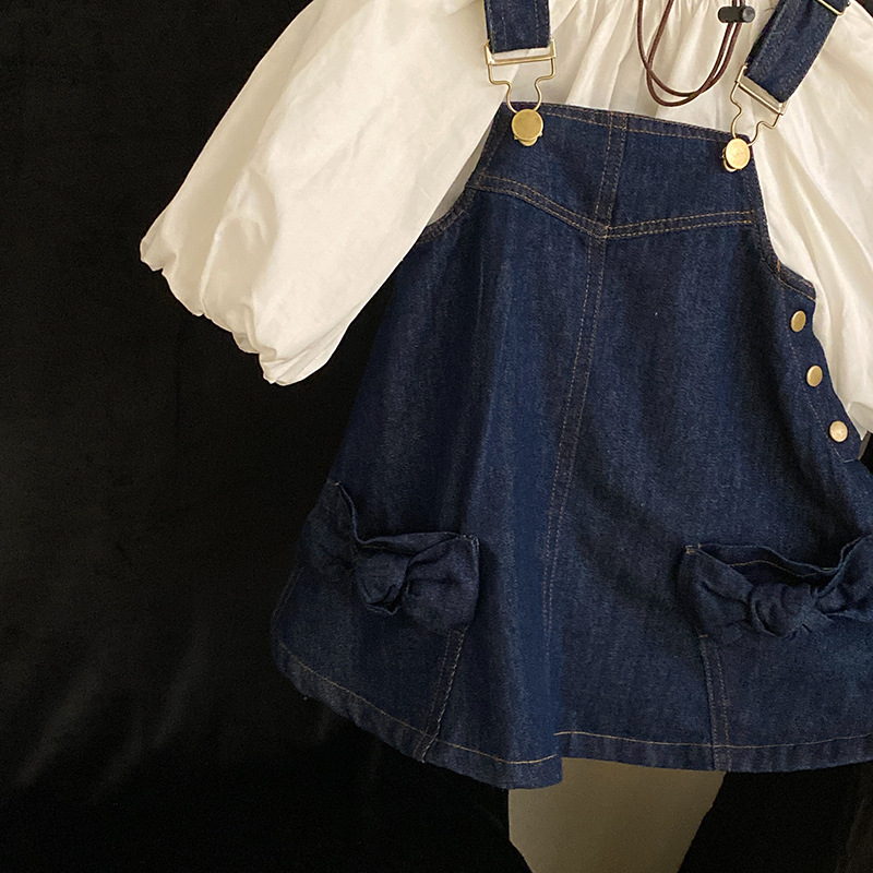Vêtements pour enfants version coréenne, ensemble chemise à manches lanternes et jupe en denim avec bretelles et nœud, nouvelle collection printemps 2023 pour filles_voghion.com